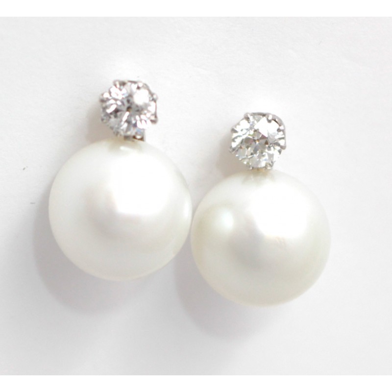 diamond and pearl drop earrings set in 18ct white gold