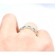 Emerald and diamond half eternity ring