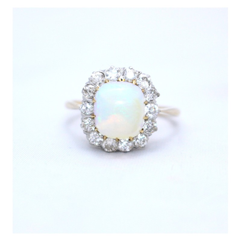 opal and diamond cluster ring set in 18ct yellow gold