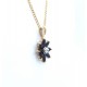 Flower shaped sapphire and diamond pendant