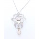 Opal and diamond ornate pendant