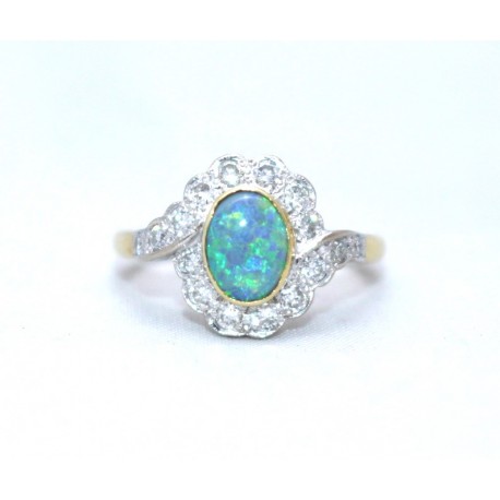 Black opal and diamond cluster ring