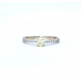 Yellow diamond ring with diamond shoulders