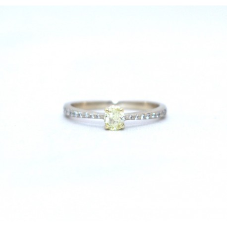 Yellow diamond ring with diamond shoulders