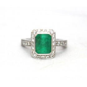 Emerald and diamond cluster ring